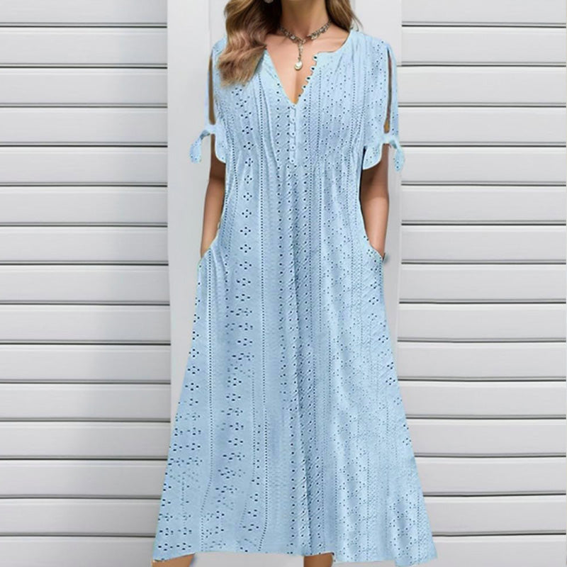 Elegante vestido de mujer con cuello en V y detalles calados