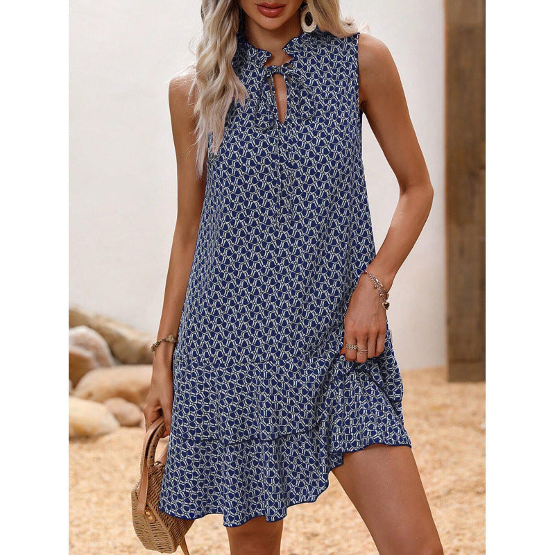 Vestido de mujer con lazo y estampado geométrico