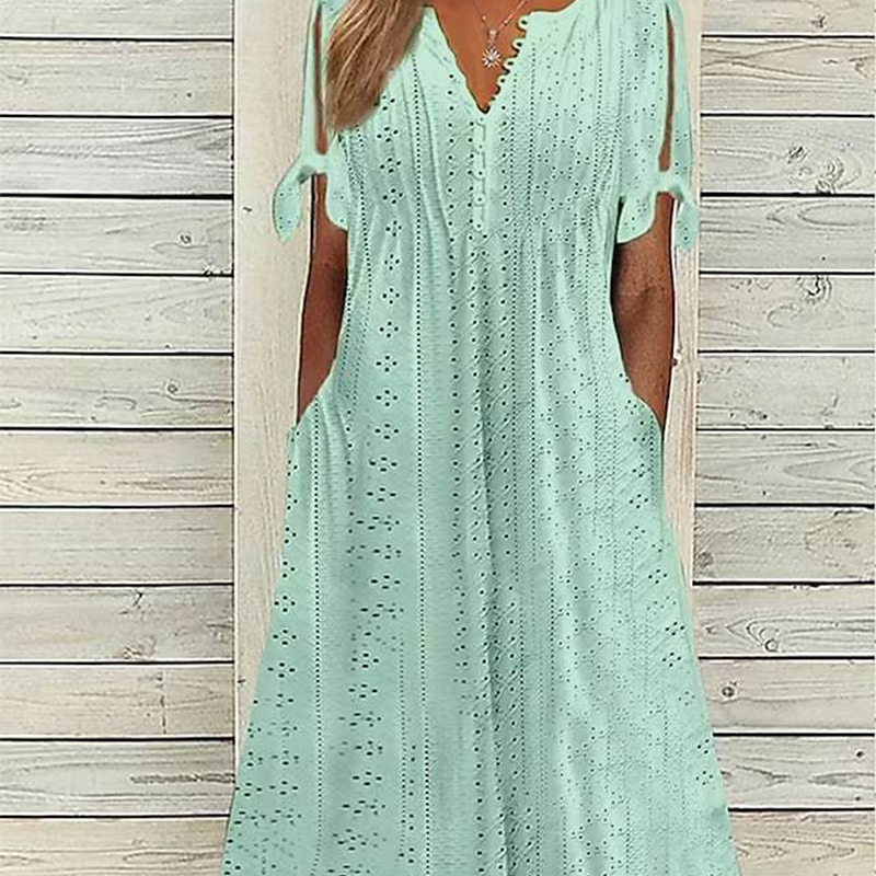 Elegante vestido de mujer con cuello en V y detalles calados