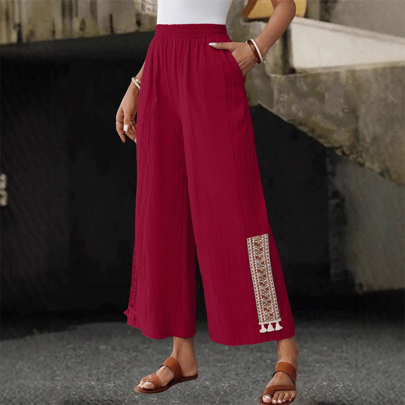 Pantalones anchos de mujer con cintura elástica y detalles de flecos